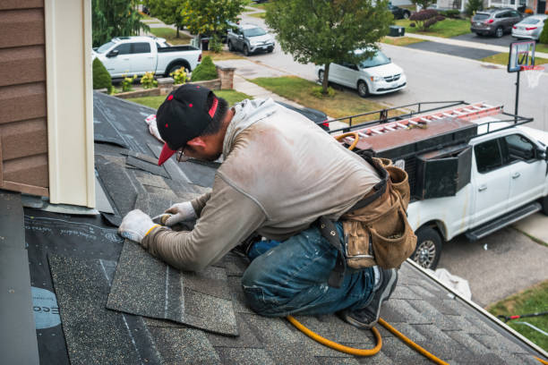 Professional Gutter Installation technician working in Maple City, MI